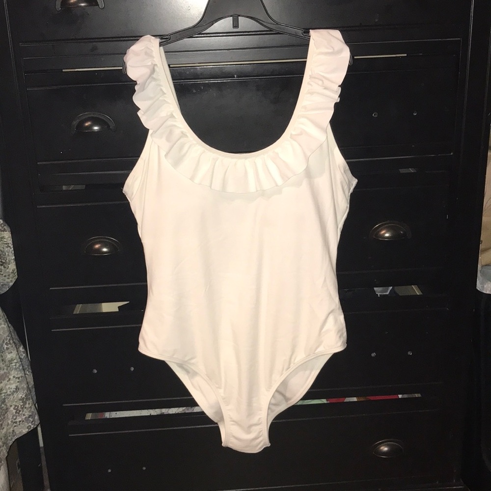 Women’s ruffled 1 piece white bathing suit
